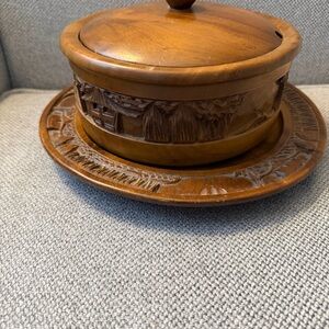vintage hand-carved wooden cake stand with a dome lid